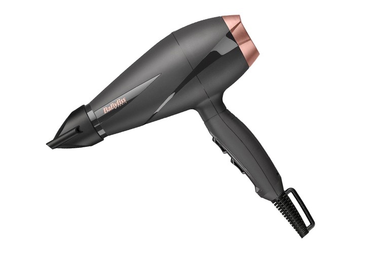 Zwarte föhn met koperen details, zijaanzicht.