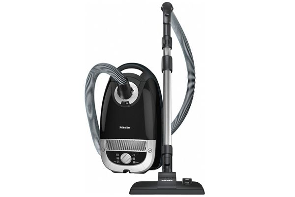 Stofzuiger met slang en zuigmond.